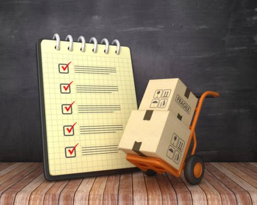 Check List Note Pad with Hand Truck on Chalkboard Background  - 3D Rendering